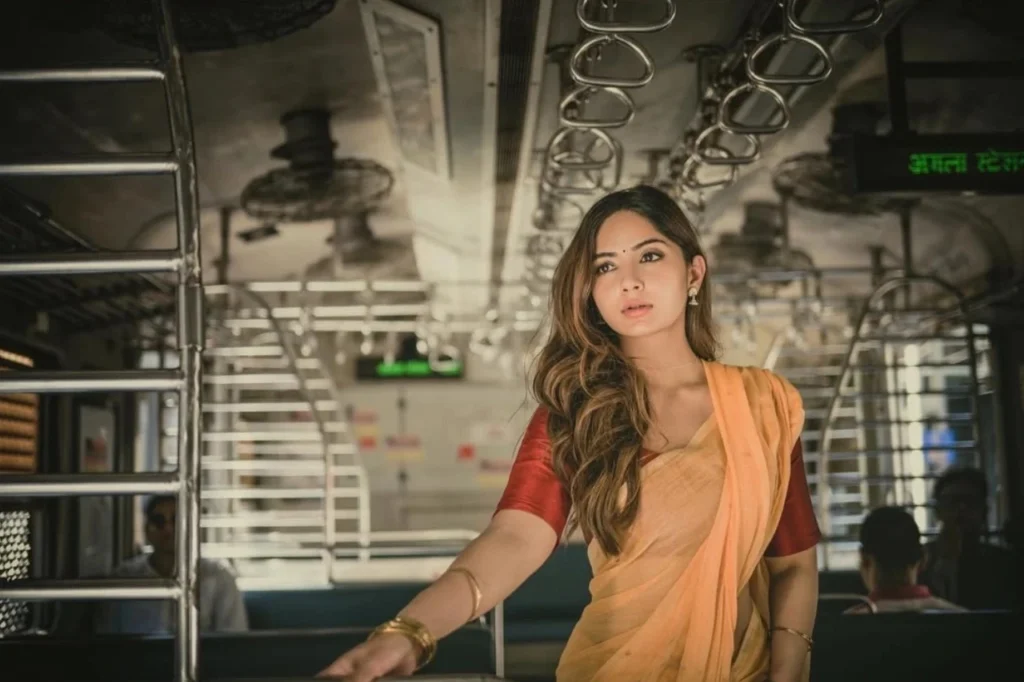 Kashmira Pardeshi Standing in Mumbai Local Train